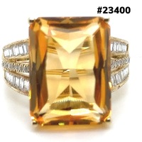  14k solid gold , 5 carat ruby and 2.8ctw side diamonds.